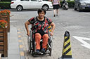 轮椅出行丈量城市文明